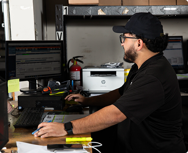 Image of a man working on a computer. Image of a man working on a computer.