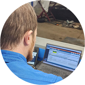 Image of a man using a laptop. Image of a man using a laptop.